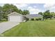 Charming single story home featuring a one car garage and meticulously manicured lawn at 3020 E 400 S, Lebanon, IN 46052