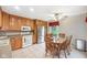 Bright kitchen features ample cabinets, stainless steel appliances, and a casual dining space at 3020 E 400 S, Lebanon, IN 46052