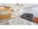 Cozy living room with wood-look floors, neutral walls, and access to the front door at 3020 E 400 S, Lebanon, IN 46052