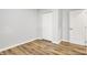 This bright bedroom has light gray walls and hardwood flooring at 3237 Thurston Dr, Indianapolis, IN 46224