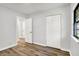 Bedroom features wood-look floors and a closet at 3237 Thurston Dr, Indianapolis, IN 46224