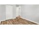Bedroom features wood-look floors and a closet at 3237 Thurston Dr, Indianapolis, IN 46224