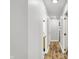 Hallway with wood floors leading to other rooms in the house at 3237 Thurston Dr, Indianapolis, IN 46224