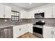Well-lit kitchen with stainless steel appliances and granite countertops, ideal for cooking and entertaining at 3237 Thurston Dr, Indianapolis, IN 46224