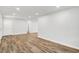 Fresh paint and wood-look floors make this an inviting living area at 3237 Thurston Dr, Indianapolis, IN 46224