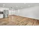 Spacious living room featuring hardwood floors and neutral paint, perfect for relaxing and entertaining at 3237 Thurston Dr, Indianapolis, IN 46224