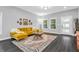 Comfortable living room with hardwood floors and a decorative area rug at 353 S Indiana St, Danville, IN 46122