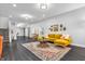 Bright living room with a modern design featuring hardwood floors and ample natural light at 353 S Indiana St, Danville, IN 46122