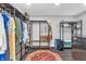 Spacious walk-in closet with custom shelving, organizing racks, and a decorative oriental rug at 353 S Indiana St, Danville, IN 46122