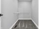 An empty walk-in closet provides a blank canvas with carpeted floors and wire shelving at 353 S Indiana St, Danville, IN 46122