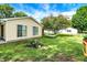 Expansive backyard with hammock strung between trees and a view of neighboring homes at 356 Daugherty St, Columbus, IN 47201