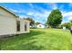 Lush backyard offers an appealing view and ample space for outdoor activities at 356 Daugherty St, Columbus, IN 47201