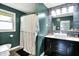 Bathroom featuring a vanity with a vessel sink, shower, and modern fixtures at 356 Daugherty St, Columbus, IN 47201