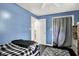 Bright bedroom with a bed, closet, and doorway, offering a peaceful and inviting atmosphere at 356 Daugherty St, Columbus, IN 47201