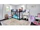 Charming ' room with bunk beds, a vanity, and a colorful rug, creating a fun and playful space at 356 Daugherty St, Columbus, IN 47201