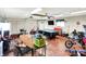 Versatile garage with a pool table, dining area, and various equipment, perfect for entertainment and storage at 356 Daugherty St, Columbus, IN 47201