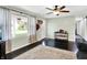 Open-concept living room with hardwood flooring and plenty of natural light, creating a welcoming space at 356 Daugherty St, Columbus, IN 47201
