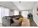 Spacious living room with vaulted ceilings, a sectional sofa, and lots of natural light at 356 Daugherty St, Columbus, IN 47201