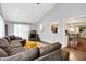 Open concept living room featuring vaulted ceilings, tile floors, and modern furnishings at 356 Daugherty St, Columbus, IN 47201