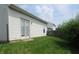 Exterior view of the backyard showcasing the side of the home at 3908 Roundwood Dr, Indianapolis, IN 46235