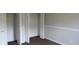 White bi-fold doors open to a closet with shelves at 3908 Roundwood Dr, Indianapolis, IN 46235