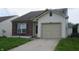 A single Gathering home featuring a well maintained driveway and one car garage at 3908 Roundwood Dr, Indianapolis, IN 46235