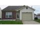 Charming single Gathering home featuring a well maintained lawn and a one car garage at 3908 Roundwood Dr, Indianapolis, IN 46235