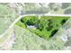 Aerial view of a home surrounded by mature trees and lush green lawn showcasing the property's privacy at 4023 Cedar Hills South Dr, Greenwood, IN 46143