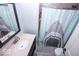 The full bathroom has a modern vanity and a walk-in shower at 4023 Cedar Hills South Dr, Greenwood, IN 46143