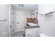 Bathroom with double sinks, decorative mirrors and tile backsplash at 4023 Cedar Hills South Dr, Greenwood, IN 46143