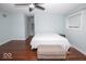 Bedroom featuring hardwood floors, ceiling fan, and light blue walls at 4023 Cedar Hills South Dr, Greenwood, IN 46143