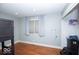 This spacious bedroom boasts hardwood floors and a neutral paint palette at 4023 Cedar Hills South Dr, Greenwood, IN 46143