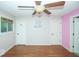 Bedroom featuring hardwood floors, ceiling fan, and neutral walls at 4023 Cedar Hills South Dr, Greenwood, IN 46143