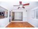 Bright living room featuring hardwood floors, wainscotting and an open floor plan at 4023 Cedar Hills South Dr, Greenwood, IN 46143