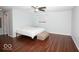 Spacious primary bedroom featuring laminate floors and soft, neutral paint at 4023 Cedar Hills South Dr, Greenwood, IN 46143
