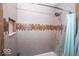 The walk-in shower features custom tile and a built-in niche at 4023 Cedar Hills South Dr, Greenwood, IN 46143
