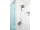 Walk-in shower featuring a rain shower head, tiled walls, and niche shelving at 4023 Cedar Hills South Dr, Greenwood, IN 46143
