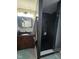 Bathroom features a dark marble walk-in shower and a dark wood vanity with a light-colored marble top at 4115 Tansel Rd, Indianapolis, IN 46234