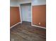 Small empty bedroom with hardwood flooring and a small closet at 4115 Tansel Rd, Indianapolis, IN 46234