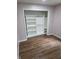 Organized walk-in closet with built-in shelves and hanging rods at 4115 Tansel Rd, Indianapolis, IN 46234