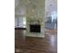 Stone fireplace in the living room, with open access to the kitchen at 4115 Tansel Rd, Indianapolis, IN 46234