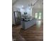 Updated kitchen with granite island, stainless steel appliances and white cabinets at 4115 Tansel Rd, Indianapolis, IN 46234