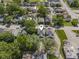 An aerial view shows houses in the neighborhood on a sunny day at 418 Harlan St, Indianapolis, IN 46201