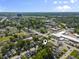 Aerial view shows the home's location on English Ave within a vibrant, tree-lined neighborhood at 418 Harlan St, Indianapolis, IN 46201