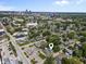 Aerial shot pinpointing home near Interstate 70, with city skyline in background at 418 Harlan St, Indianapolis, IN 46201
