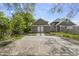 Spacious backyard featuring a concrete slab, perfect for parking or outdoor activities at 418 Harlan St, Indianapolis, IN 46201