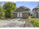 Spacious backyard featuring a concrete slab, perfect for parking or outdoor activities at 418 Harlan St, Indianapolis, IN 46201
