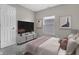 Cozy bedroom showcasing a comfortable bed, a large screen TV and plenty of storage space at 418 Harlan St, Indianapolis, IN 46201