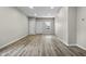 Spacious living room with hardwood floors, and modern lighting at 418 Harlan St, Indianapolis, IN 46201