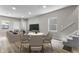 Open-concept living and dining area with new flooring and ample natural light at 418 Harlan St, Indianapolis, IN 46201